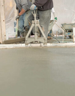 Concrete floor being levelled | EasyMix Concrete