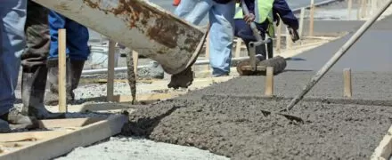 Concrete pump in use on a work site | EasyMix Concrete