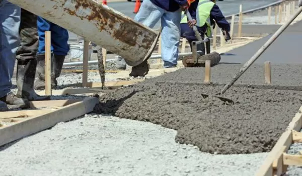 Concrete pump in use on a work site | EasyMix Concrete 