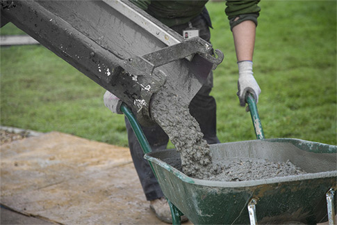 Concrete poured into a wheelbarrow | EasyMix Concrete
