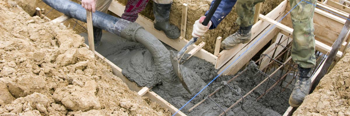 Concrete being poured before setting process | EasyMix Concrete