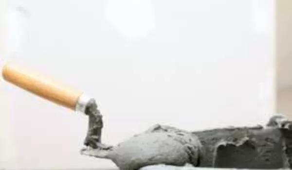 Trowel and concrete bucket | EasyMix Concrete 